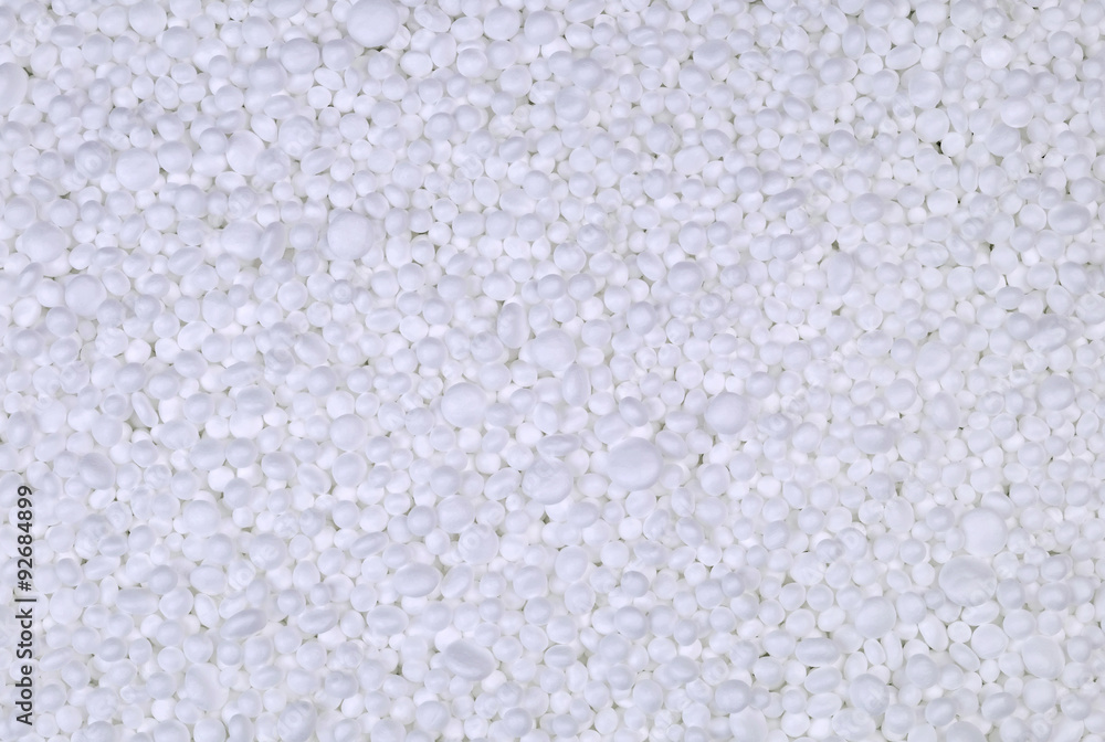 Fototapeta premium Background from filler of small white pieces of Styrofoam for packaging.
