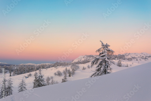 Magical sunset winter in Julian Alps mountains