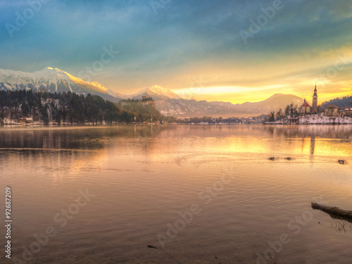 Amazing sunrise at the lake Bled in winter