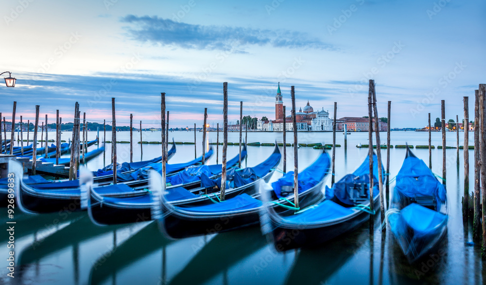 Fototapeta premium Gondolas in Venice at sunrise
