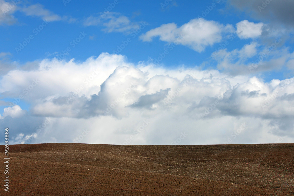 Rolling Farms Fields with Bright Blue Sky Rolling Farms Fields with Bright Blue Sky