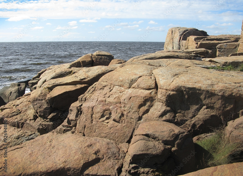 Natural rock landscape at Skrea Strand on a sunny day in Falkenberg, Sweden.