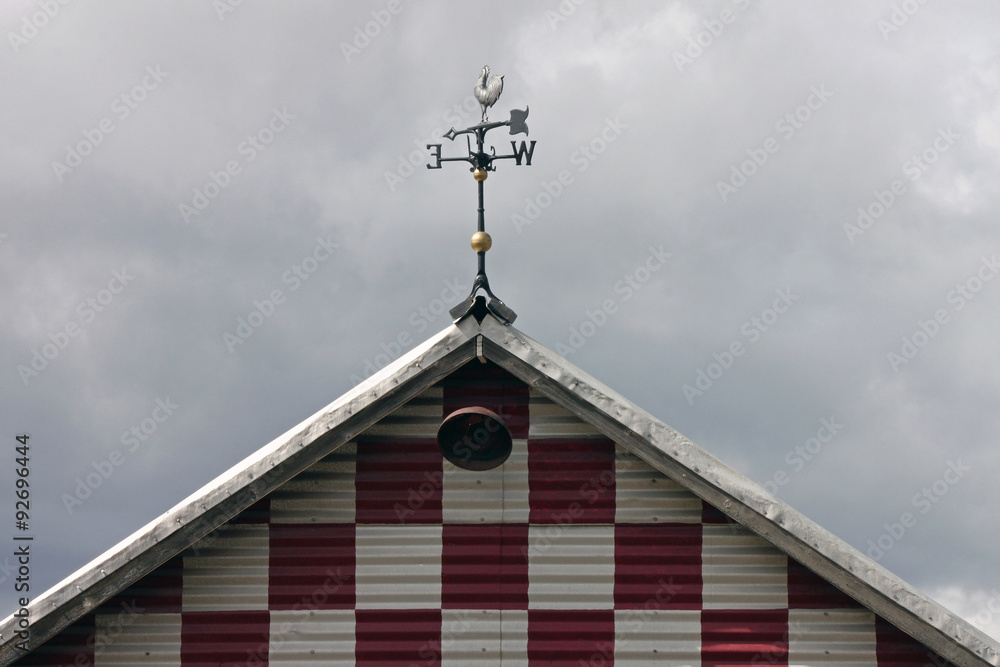 Red-checkered Barn with Weather Vane