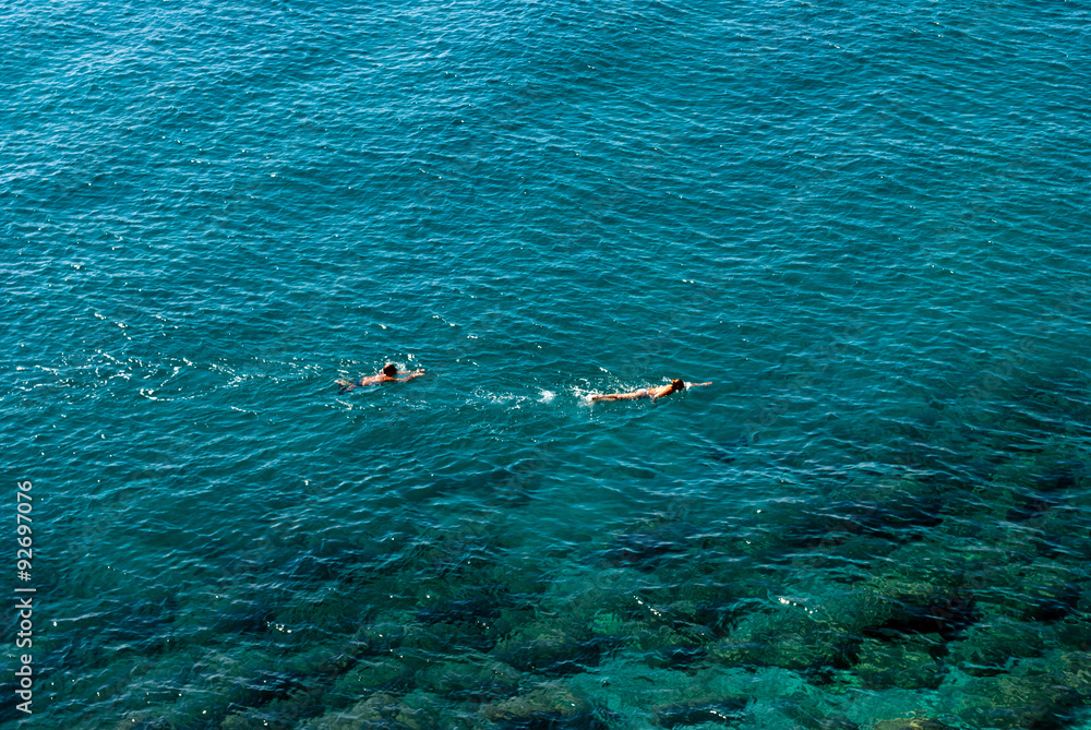 Obraz premium Swimmers offshore