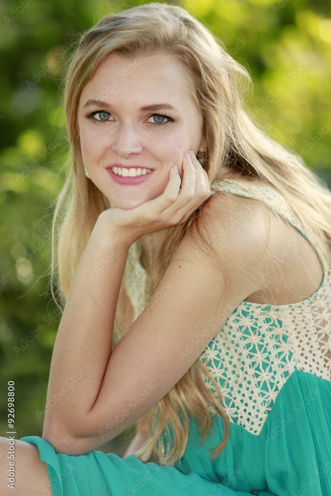 Outdoors portrait of beautiful young blonde girl Outdoors portrait of beautiful young blonde girl