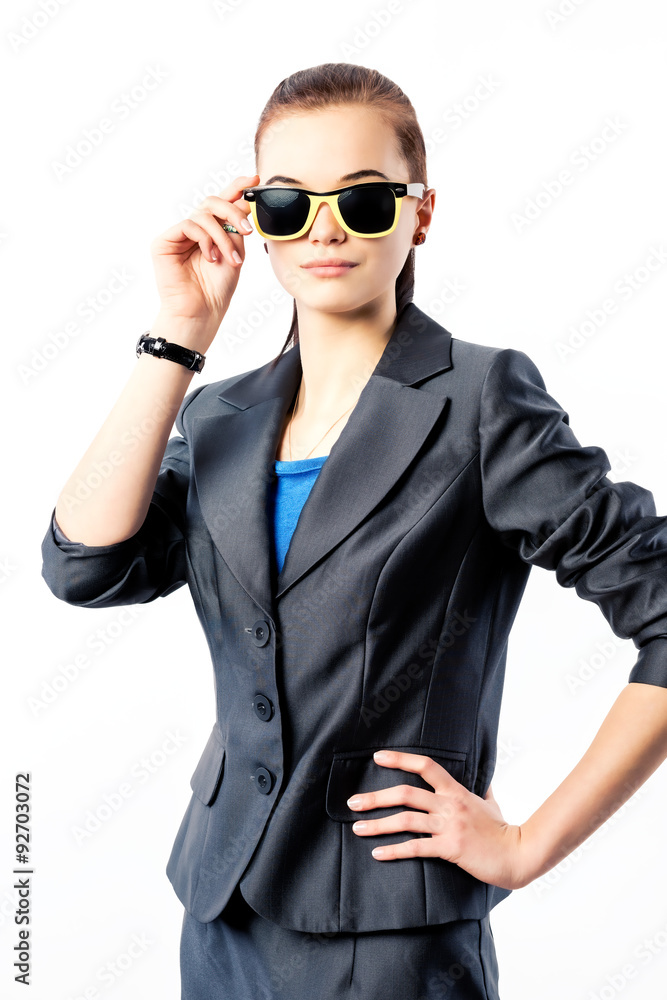 Young beautiful girl in a jacket and sunglasses Young beautiful girl in a jacket and sunglasses