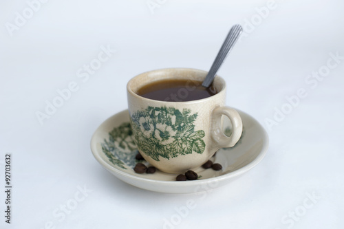 Photography Traditional oriental Chinese coffee in vintage mug with white background