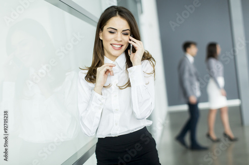 Young woman in office with ...