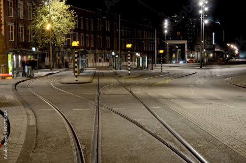 Abstract cityscape with tram tracks on the road in Amsterdam, Ne