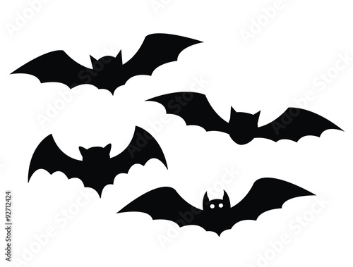 Black bats set on a white background