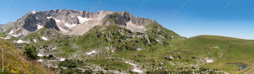 Psheho-Su mountain and lake Psenodah (on the right) landscape. Lago-Naki plateau, Caucasus, Russia, summer. Panorama.