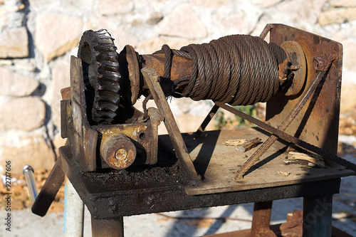 Old winch with open gear shaft