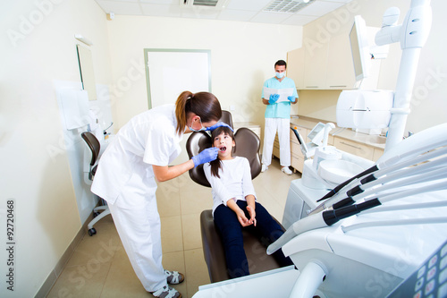 Young girl getting her dental checkup