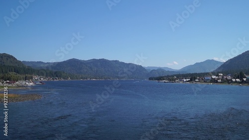 View from the bridge over the river Biya of the lake Teletskoye and villages Artybash and Iogach in summer.