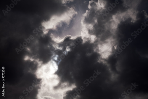 black thundercloud with sunbeam