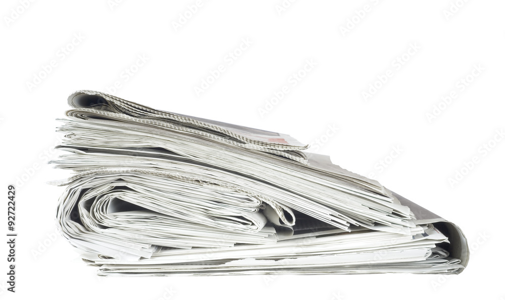 newspaper stack, isolated on white background, free copy space newspaper stack, isolated on white background, free copy space