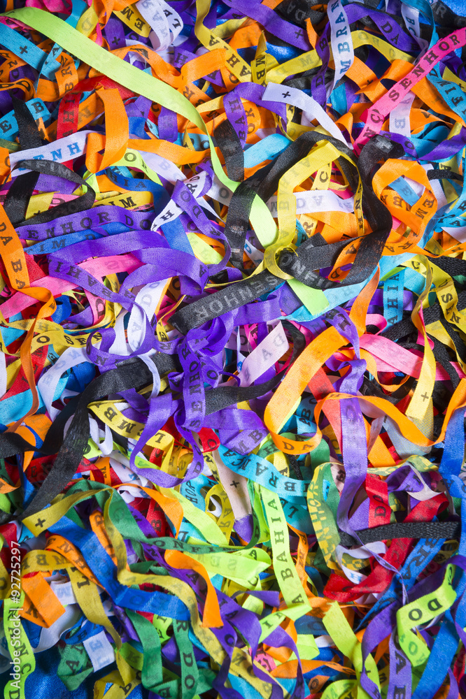 Brazilian wish ribbons pile in a colorful full frame background