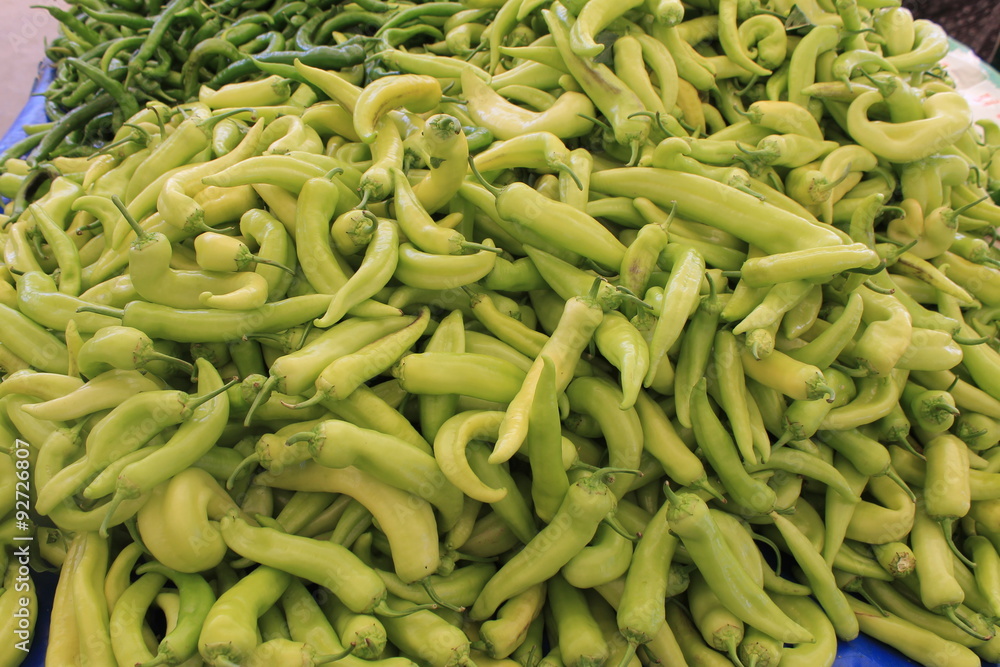 Many green pepper bitter on the table Many green pepper bitter on the table