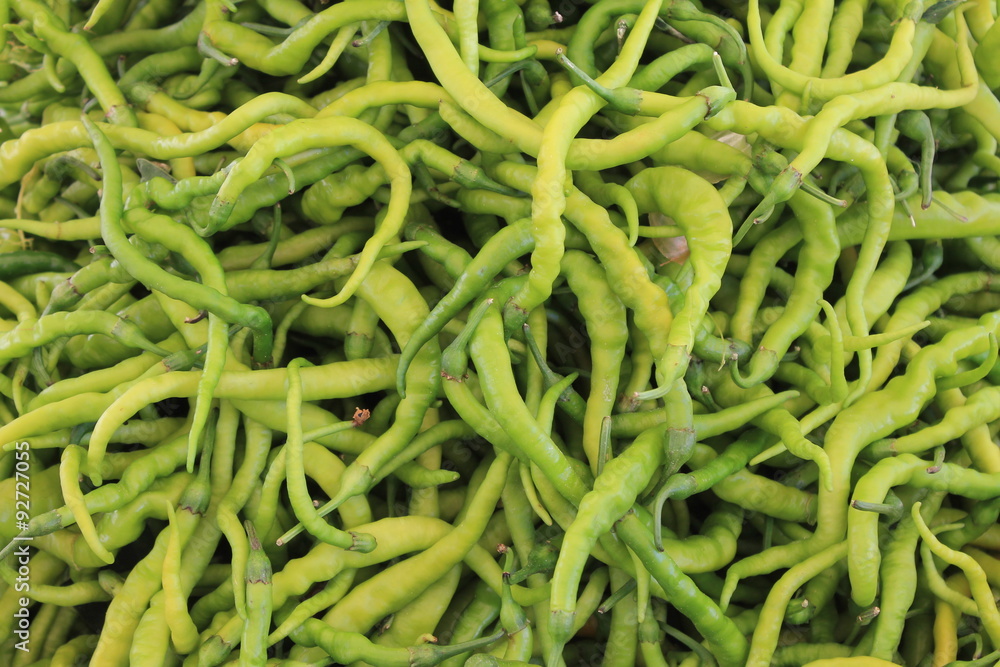 Many green pepper bitter on the table Many green pepper bitter on the table