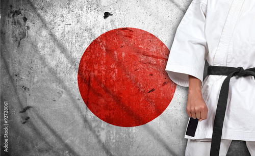 boy in kimono and japan flag