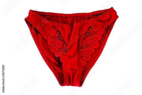 Red thong panties on white background