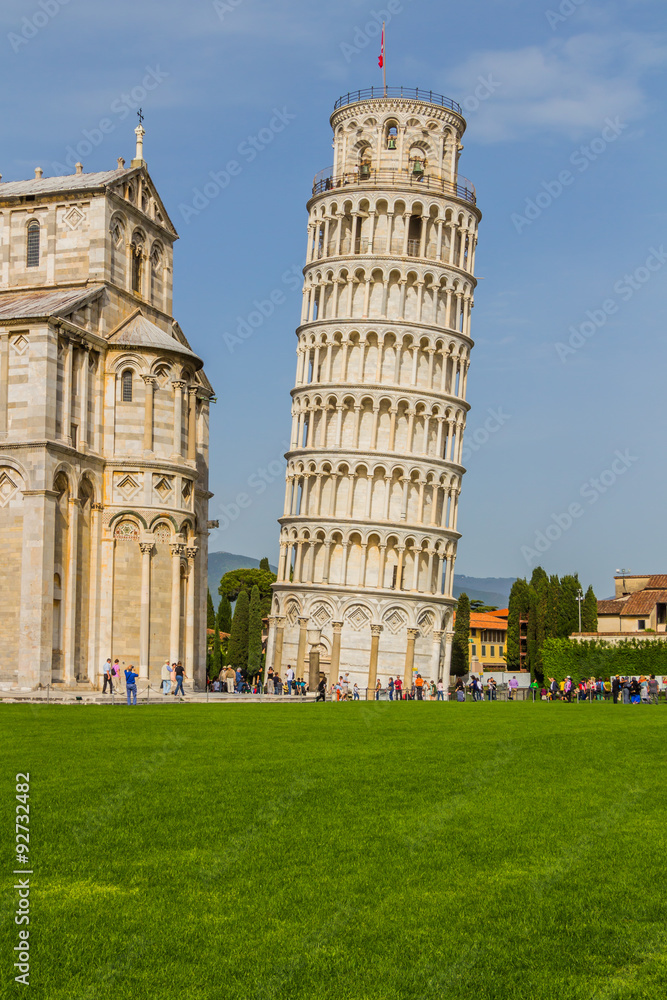 Leaning tower and Pisa cathedral in a summer day in Pisa, Italy