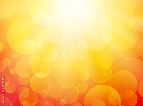 summer yellow background with bokeh and rays