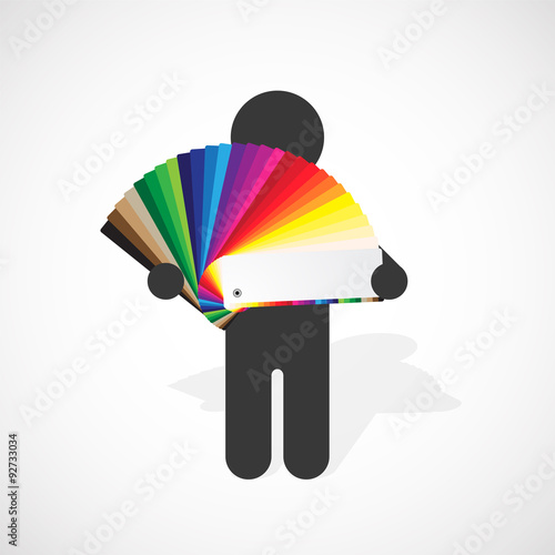 black silhouette of a man holds developed color swatches palette with bright colors © mimacz