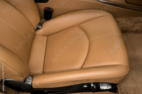 Leather car seat. Interior detail. © alexdemeshko
