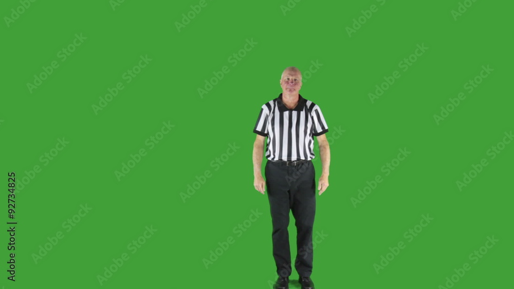 Man dressed in basketball referee uniform signaling Illegal Dribble. Man dressed in basketball referee uniform signaling Illegal Dribble.