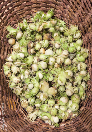 Bild auf Leinwand Fresh nuts in caneworked basket