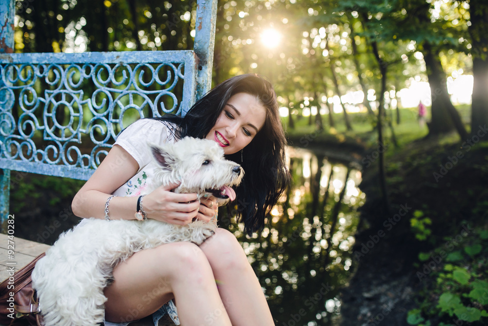 girl playing with a dog girl playing with a dog