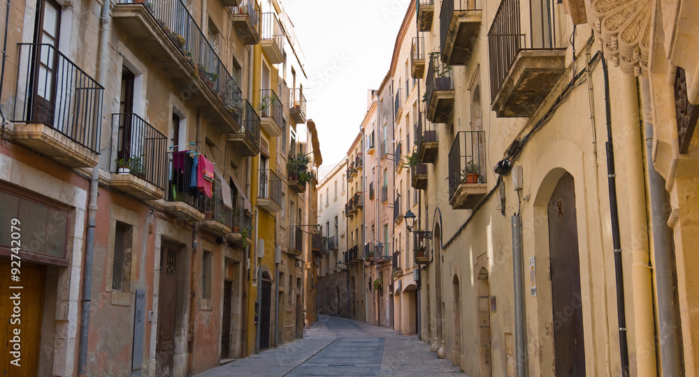 Tarragona old town buildings and narrow street, Catalonia, Spain