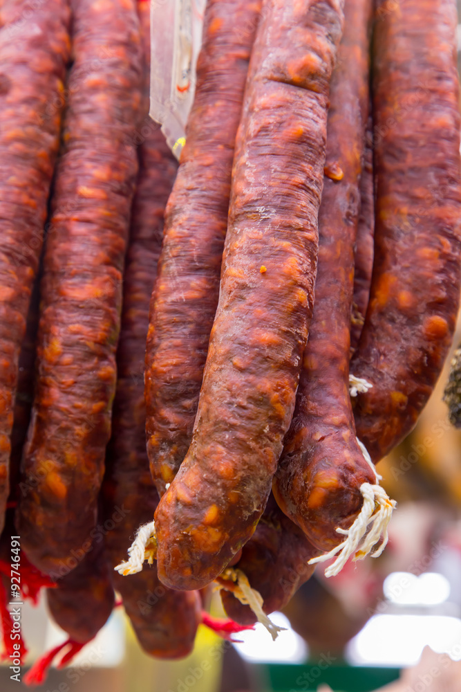 Fototapeta premium Catalan dry sausages called fuet at Mercat de Sant Josep de la Boqueria market in Barcelona