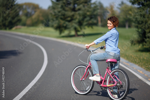 Active girl riding a bicycle 