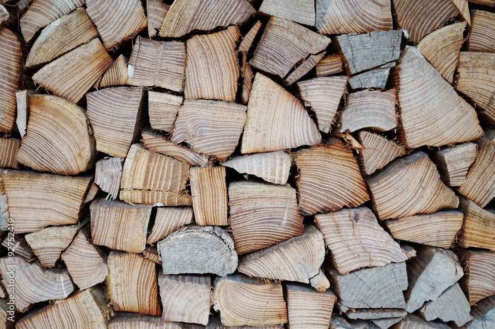 Fototapeta premium Pile of chopped wood background