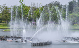 fountain in pond in garden, bangkok, thailand