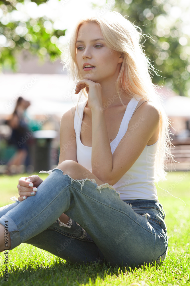 Beautiful young blond girl outdoors