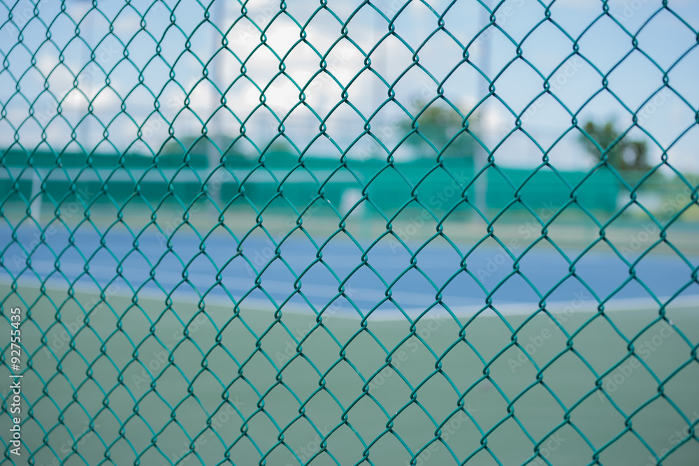 cage of blurred tennis court cage of blurred tennis court