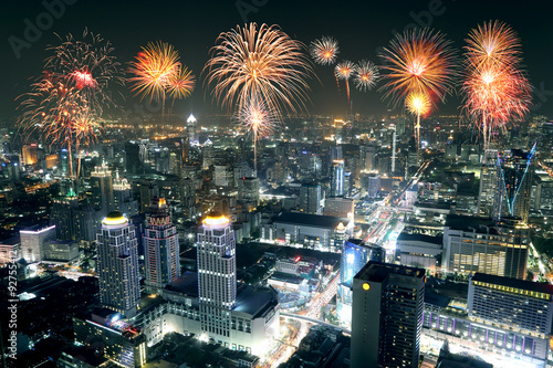 Fireworks celebrating over Bangkok cityscape at night