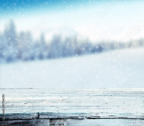 Winter snowy background with wooden planks © Jag_cz