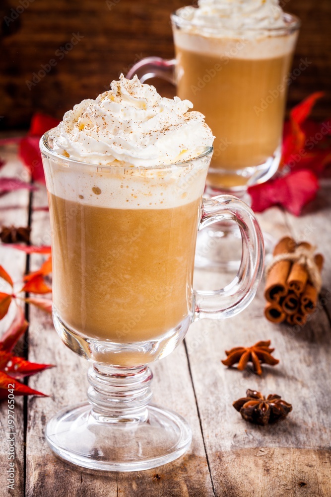 pumpkin latte with whipped cream in a glass jar pumpkin latte with whipped cream in a glass jar
