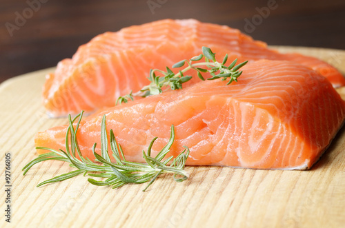 Raw salmon on cutting board