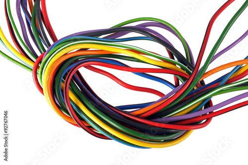 Close up photo of multicoloured wire on a white background. © J and S Photography