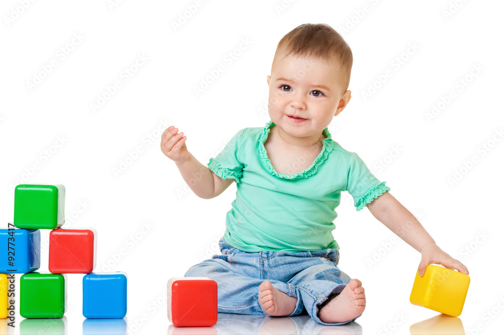 Funny baby girl with blocks, isolated on white Funny baby girl with blocks, isolated on white