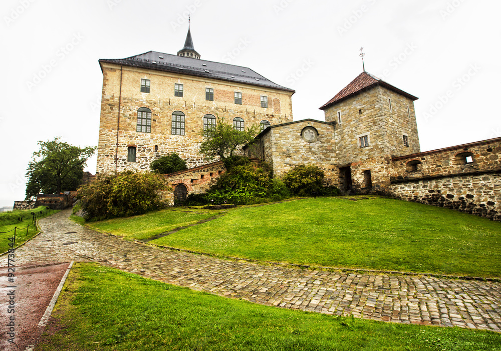 Akershus Fortress in rainy day. Oslo. Norway. Akershus Fortress is a medieval castle that was built to protect Oslo, the capital of Norway. It has also been used as a prison. Akershus Fortress in rainy day. Oslo. Norway. Akershus Fortress is a medieval castle that was built to protect Oslo, the capital of Norway. It has also been used as a prison.