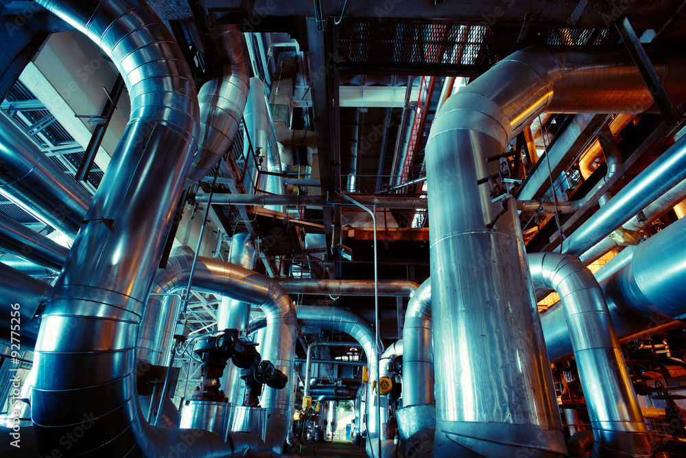 Equipment, cables and piping as found inside of a modern industr Equipment, cables and piping as found inside of a modern industr