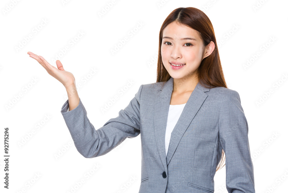 Young businesswoman with open hand palm Young businesswoman with open hand palm