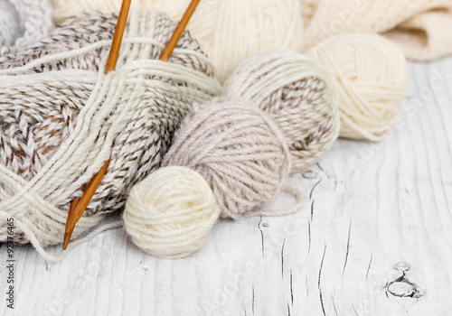 Skeins of wool and knitting needles