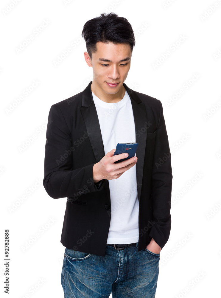 Businessman play the game on mobile phone Businessman play the game on mobile phone